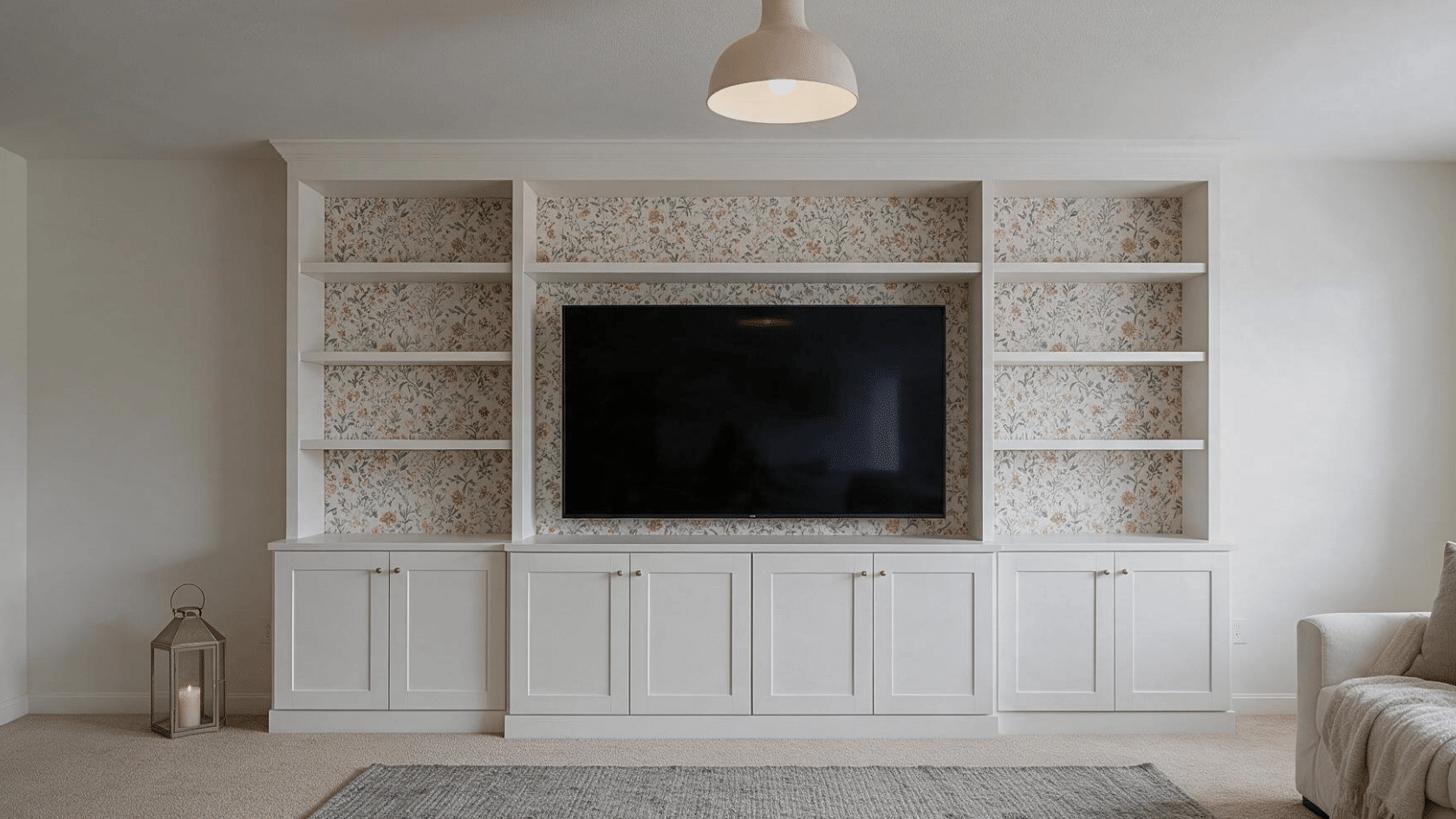 TV lift cabinet IKEA setup with hidden television storage and built-in living room shelves