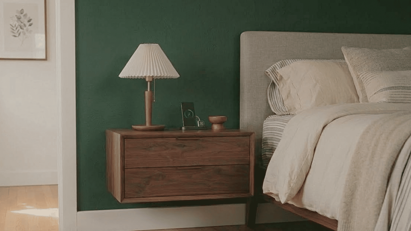 A floating wall-mounted nightstand design keeps floors open while adding compact bedside storage with a clean bedroom setup.